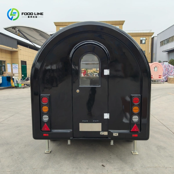 black door of the round trailer