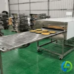 electric conveyor pizza oven at the factory
